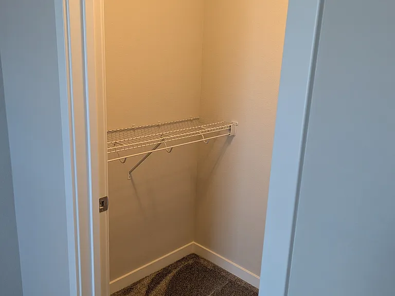Upstairs Bedroom 1 closet