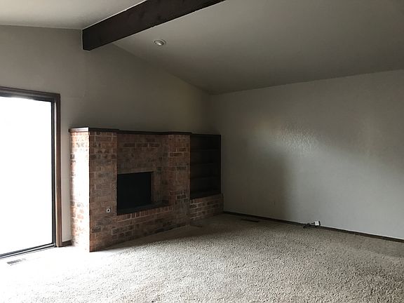 Living room with vaulted ceiling