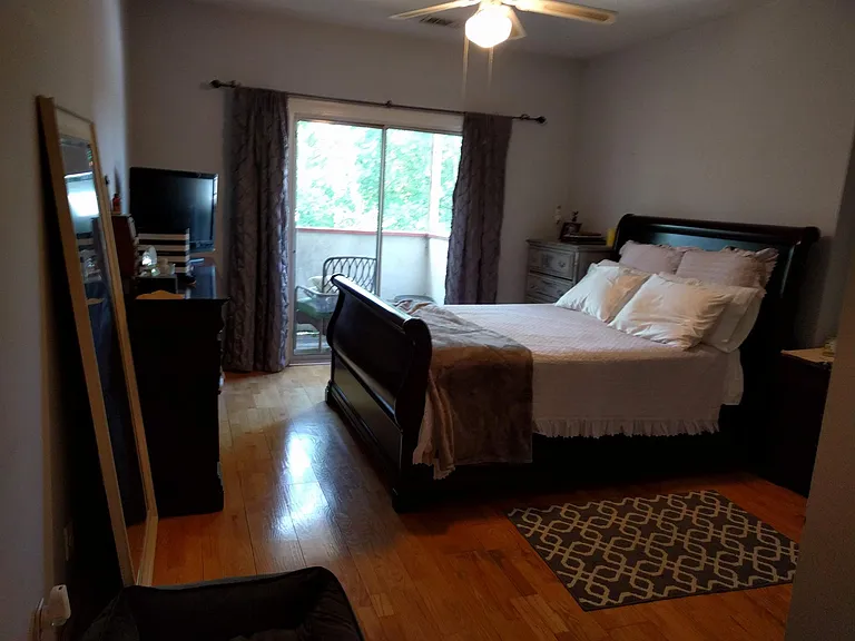 Large Bedroom shown with furniture and access to private bal
