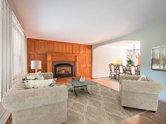 Inviting formal living room w/beautiful fireplace.