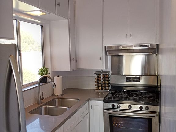 Renovated kitchen with stainless appliances