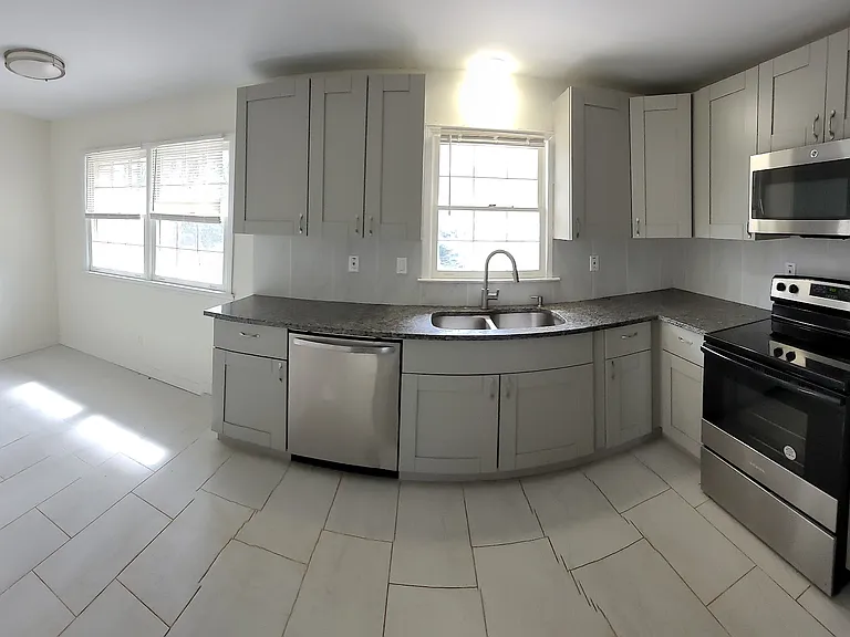 Kitchen w Breakfast area N Laundry room