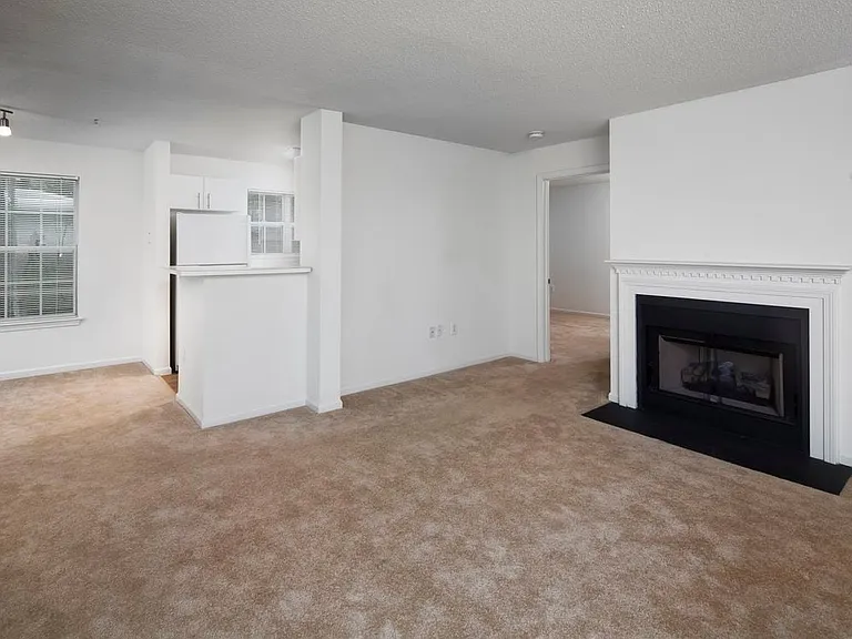 Wilmington Classic Package dining and living areas with fireplace