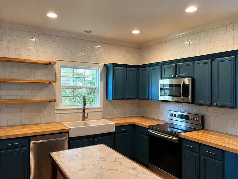 Remodeled kitchen with farm sink