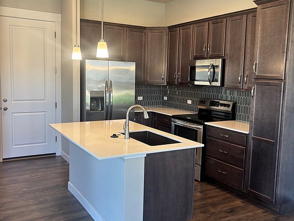 Open Kitchen with Quartz Counters