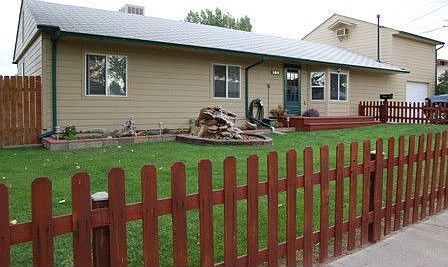 Front is Completely Fenced with an Automatic Sprinkler System