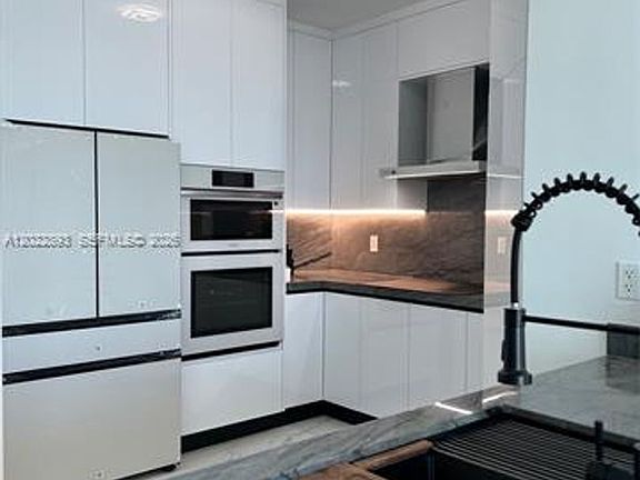 5th image of 7910 Harbor Island Dr APT 1202