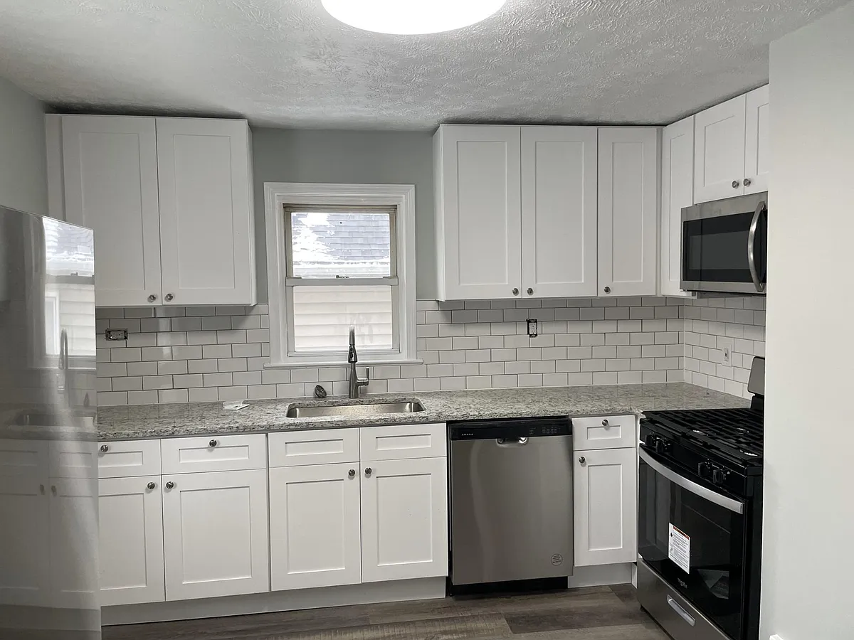 Soft-close cabinets, granite counters, stainless-steel appliances! - 30132 Robert St