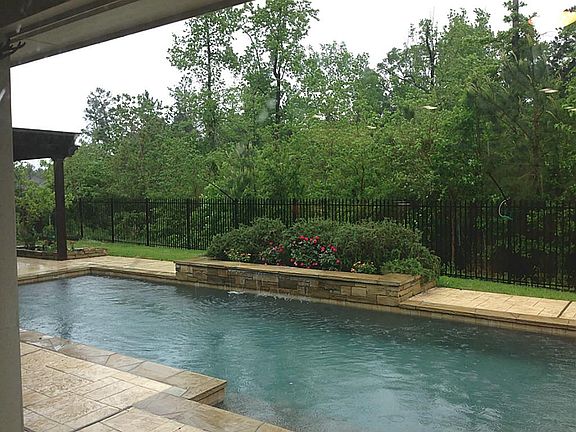 View of the pool from the main living area. VERY private back yard overlooking the nature reserve.