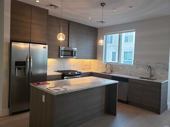 3rd image of 162 Beach 6th St Unit B