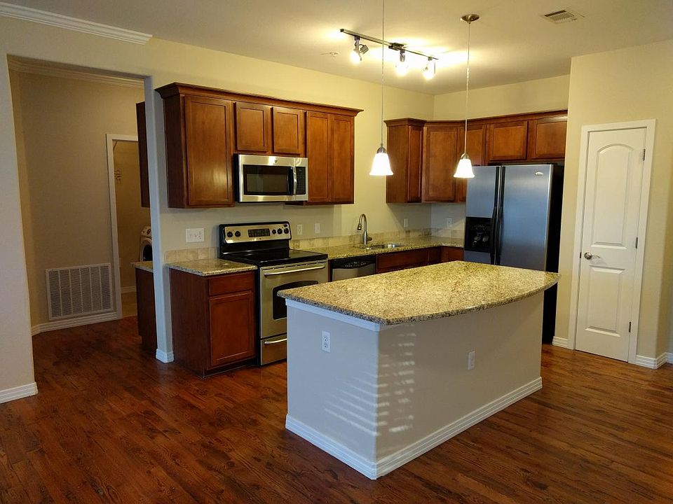 granite kitchen with steal appliances