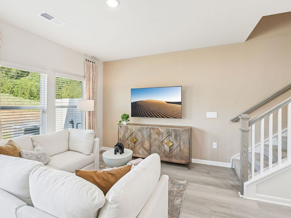RAL_OakwoodTownes_Topaz_GreatRoom3_1064WindingSpringDr_Model.jpg