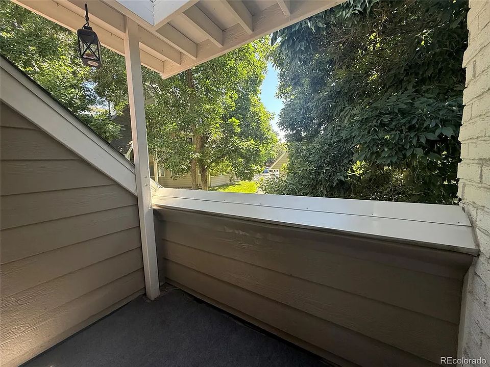 Private covered patio with skylight