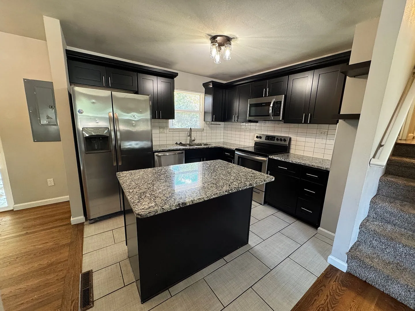 Stylish Tri-Level with Bonus Living Space and Huge Backyard! — Photo 4