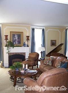 Living Room
						:
						The living room has a gas insert fireplace with smart control remote.