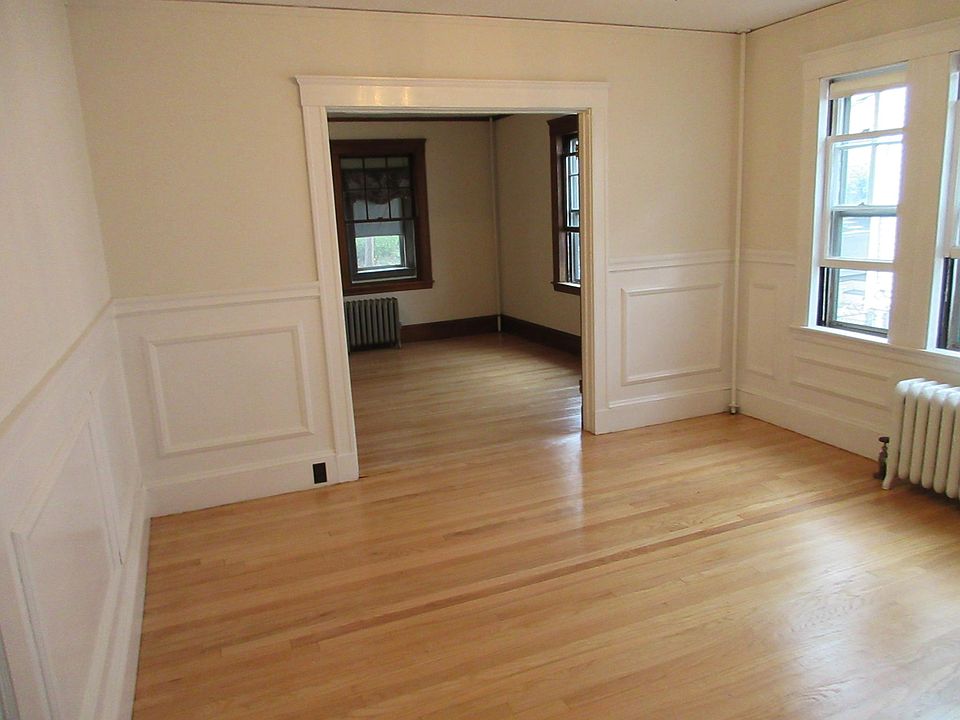 Dining room with chandelier and built in china closet.
