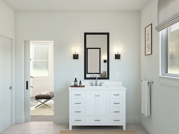 Primary bath with freestanding vanity
