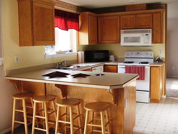 Kitchen is adjacent to family room