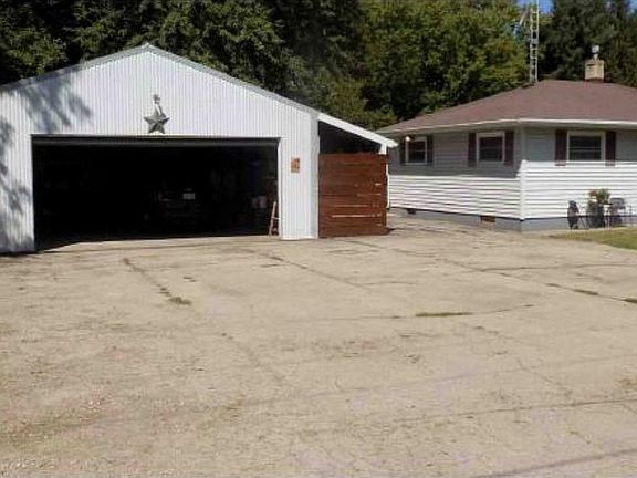 Front view of the house and garage