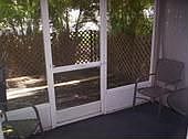 Screened in porch w/ attached deck