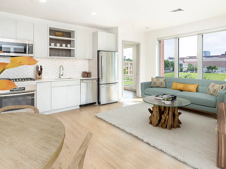 The Flats - Kitchen and Living Room with Floor-to-Ceiling Windows