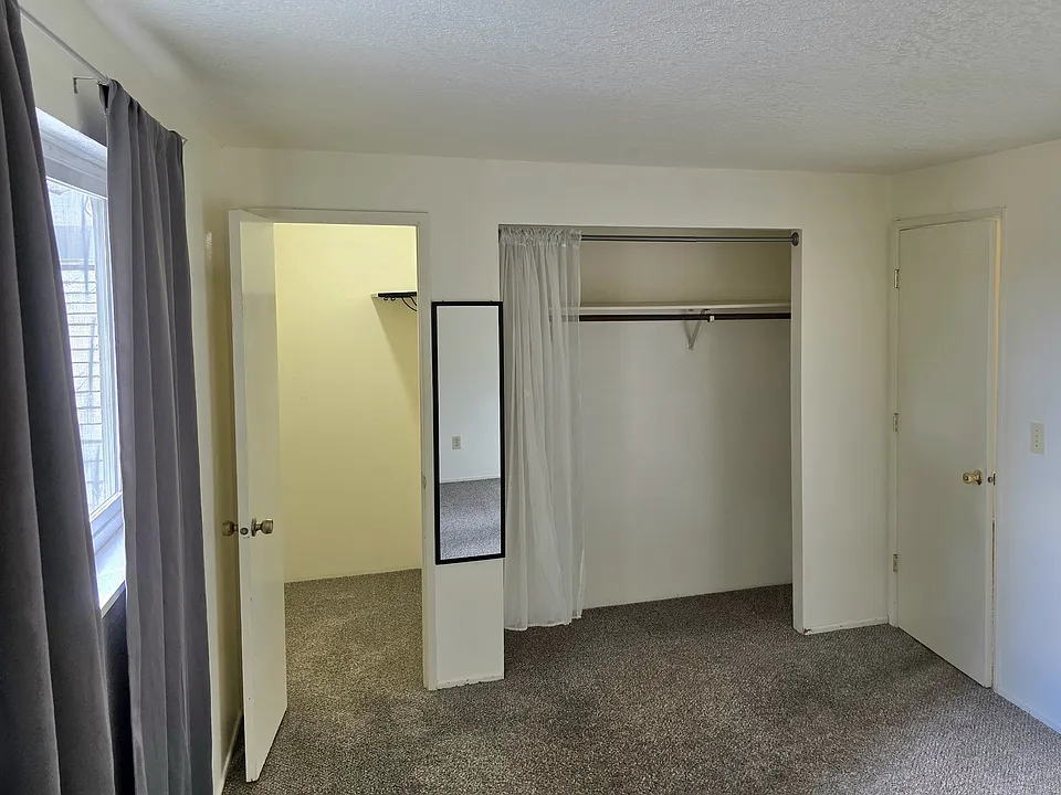 Bedroom 31 with walk in closet and an extra closet