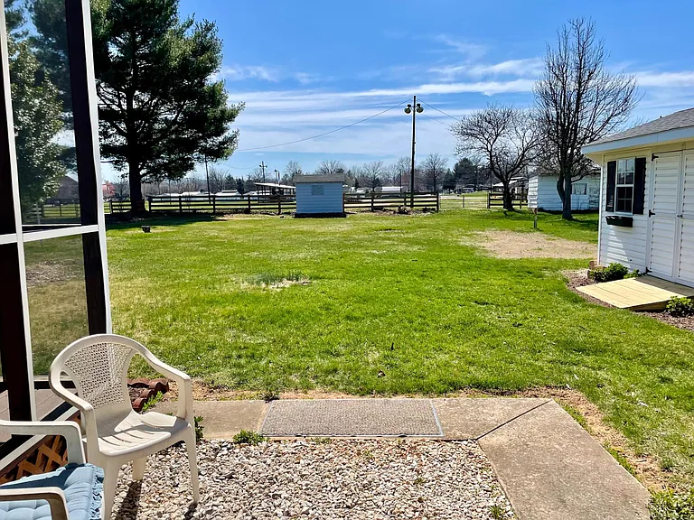 Spacious backyard provides great grilling and entertaining areas.
