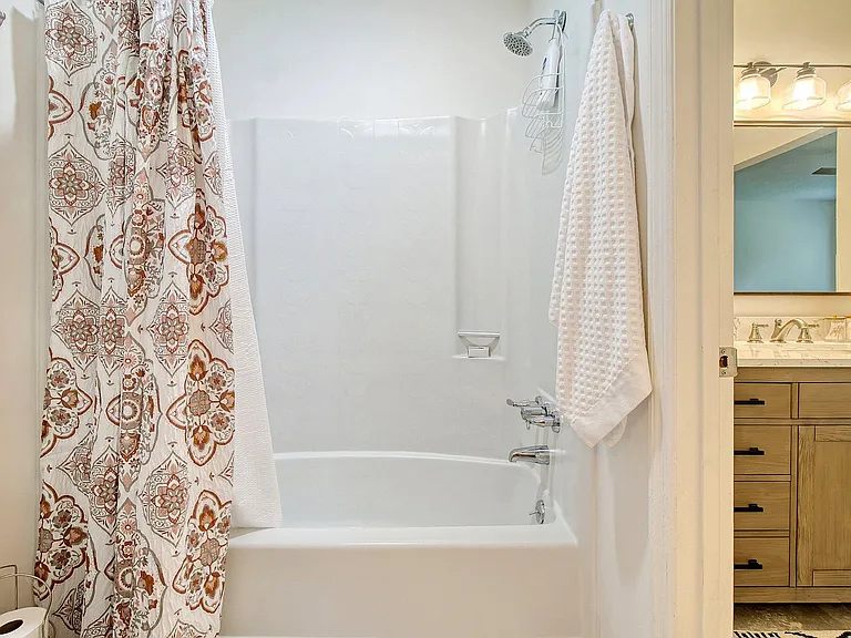 New fixtures and shower head create a spa-like experience