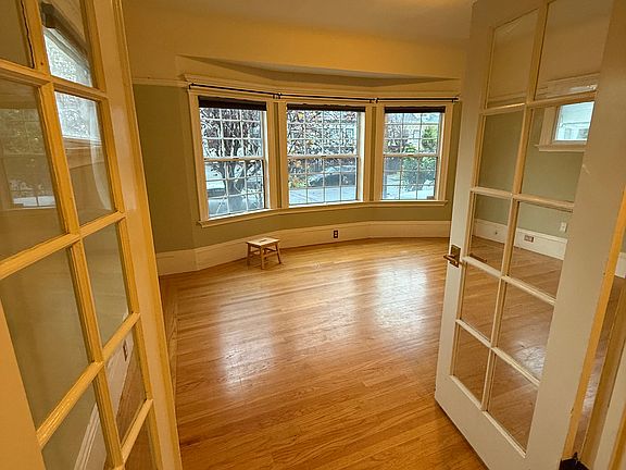 Front room, (has been used as a bedroom in the past) a beautiful welcoming space right next to the entry hallway/foyer. This is downstairs and provides a great space away from 2nd floor bedrooms to relax, watch TV, etc.