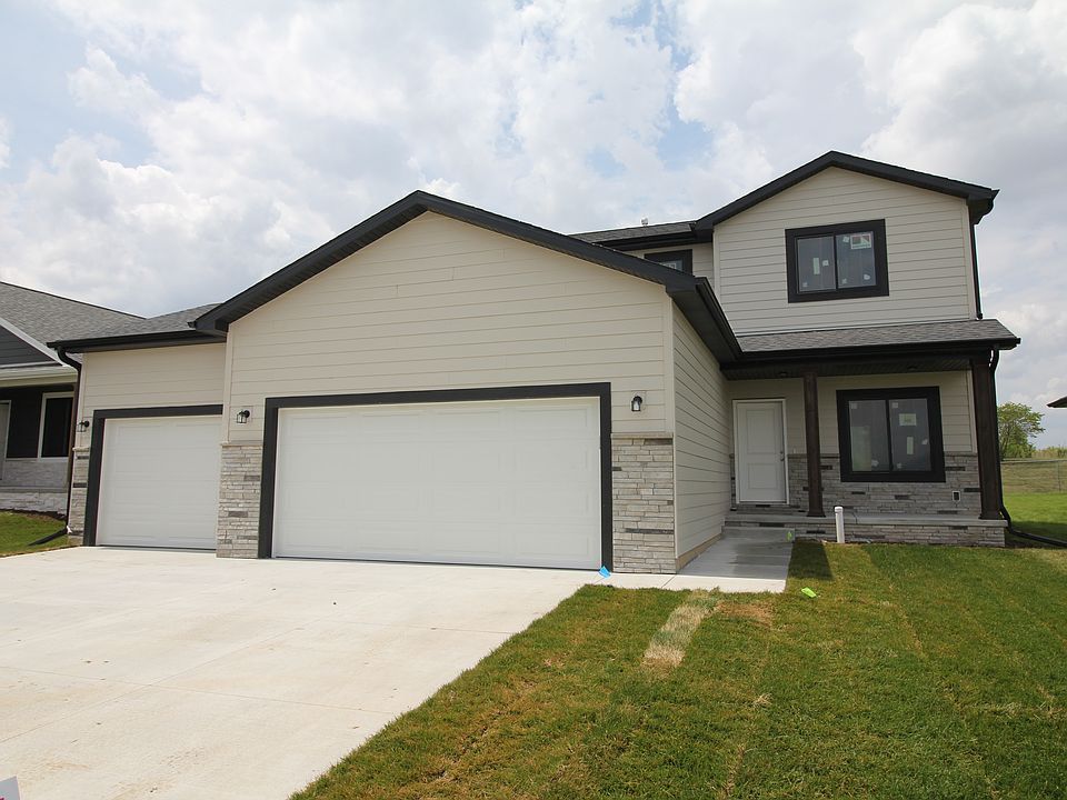 Home shows upgrade to three-stall garage.