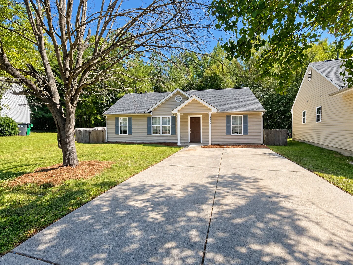 Westwinds3044 is a three-bedroom, two-bath home in Charlotte's Windsong Village — Photo 1