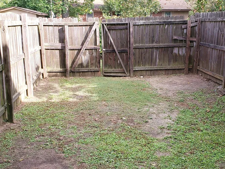 Small, enclosed rear/backyard; great for grilling, privacy and enjoyment!