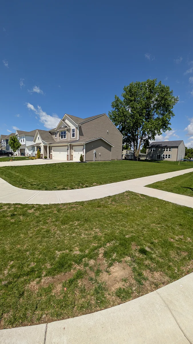 Front exterior and covered entry - 9160 Larson Dr
