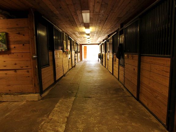 Horse stalls and wide aisles