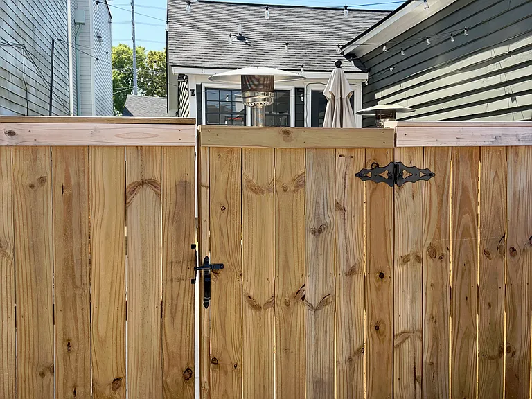 Entry gate. Fully fenced in yard