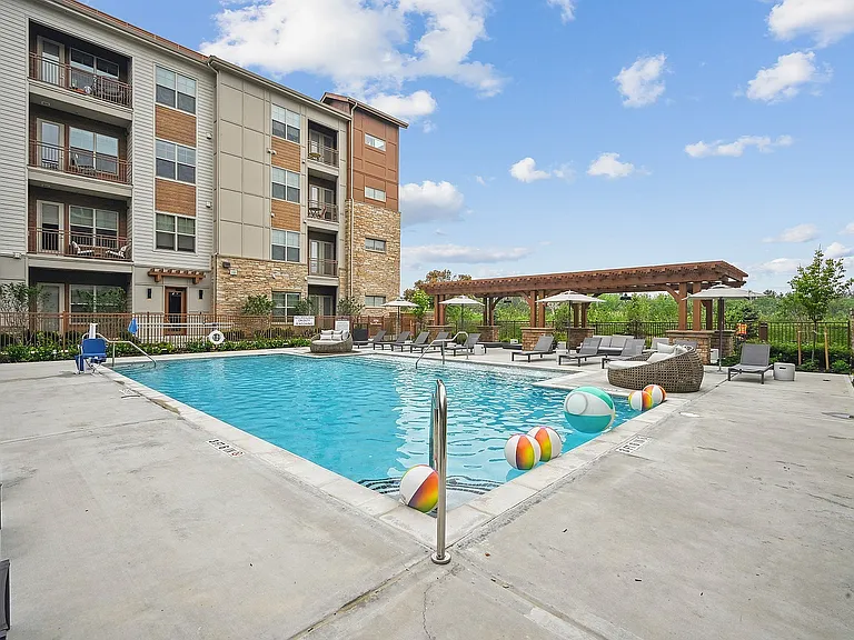 Refreshing moments await in your resident pool.