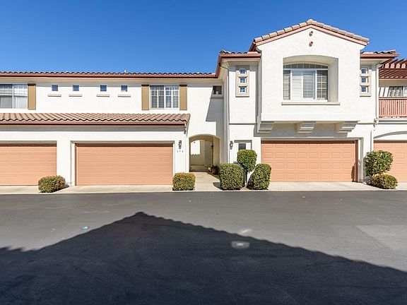 Two car garage with semi-private front entryway.