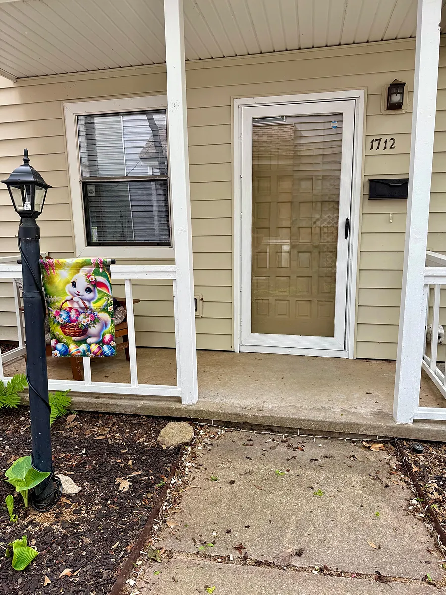 Front porch area and storm door - 1712 S Cheyenne Ave #3