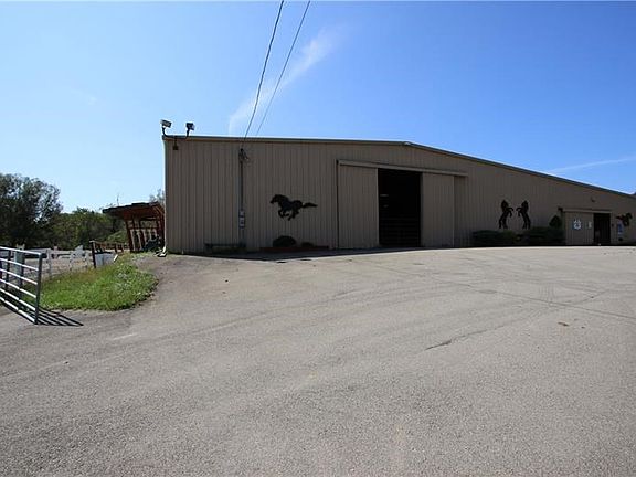 MASSIVE 240x36 Stall area adjacent to 180x80 Indoor Competition Arena set up w/ Sound System, Lighting & Professional GEOTEXTILE