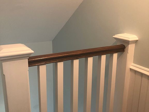 This is the landing right outside the unit. This tenant keeps boots and umbrellas here in the winter.