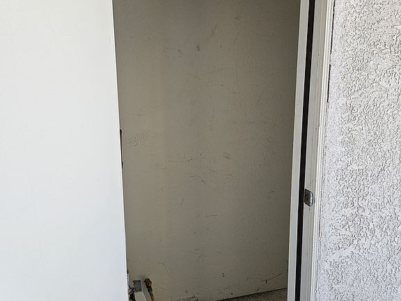 locked storage room outside by front door