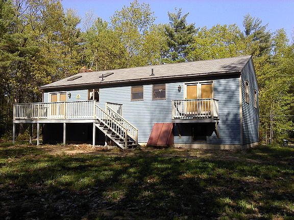 Large backyard & Sliders to Deck off the Dining Area