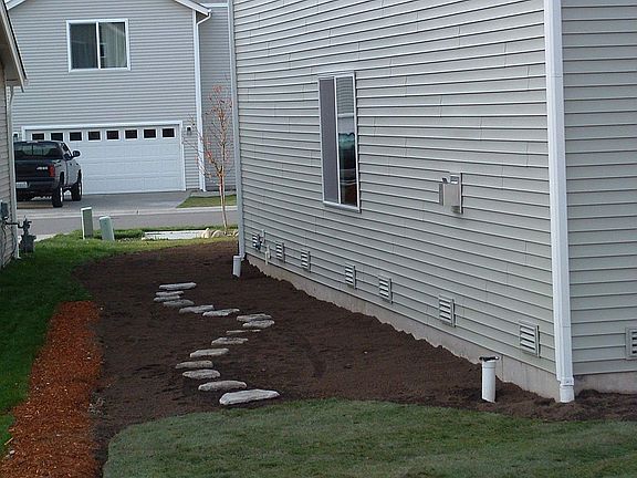 side yard, now fenced