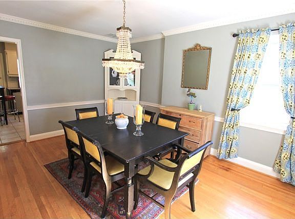 Dining Room w/Custom Crown Molding, Crystal Chandelier & Chair Railing