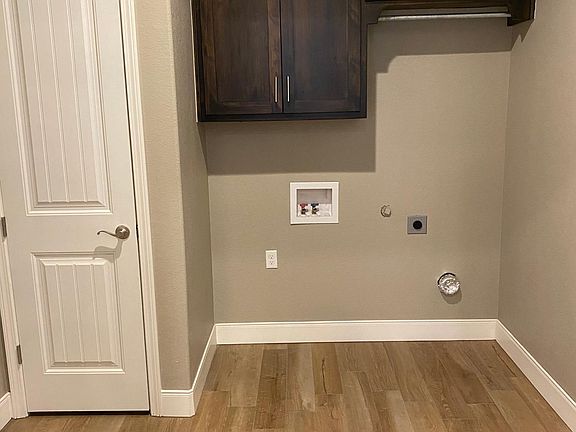 Extra large laundry room with pantry