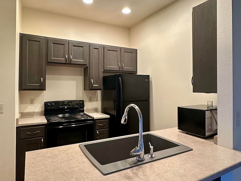 The kitchen is just right for daily meals or entertaining.