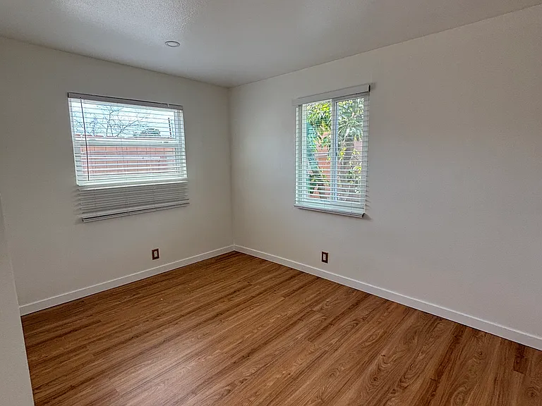 Spacious bedroom with recess lights and closet