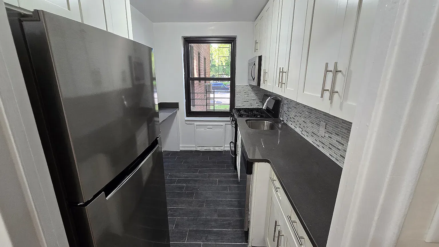 212-03 75th Avenue — Photo 2