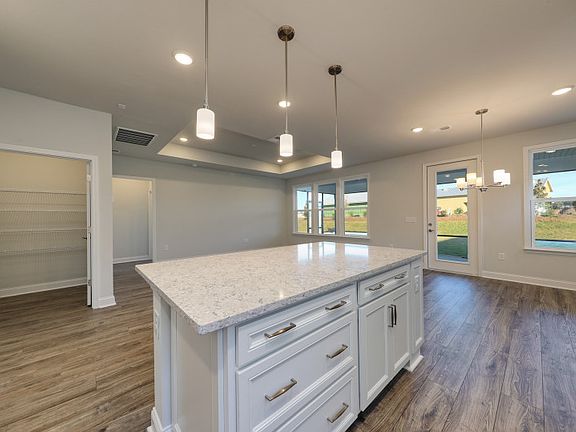 Open Kitchen that flows into the gathering room and cafe.