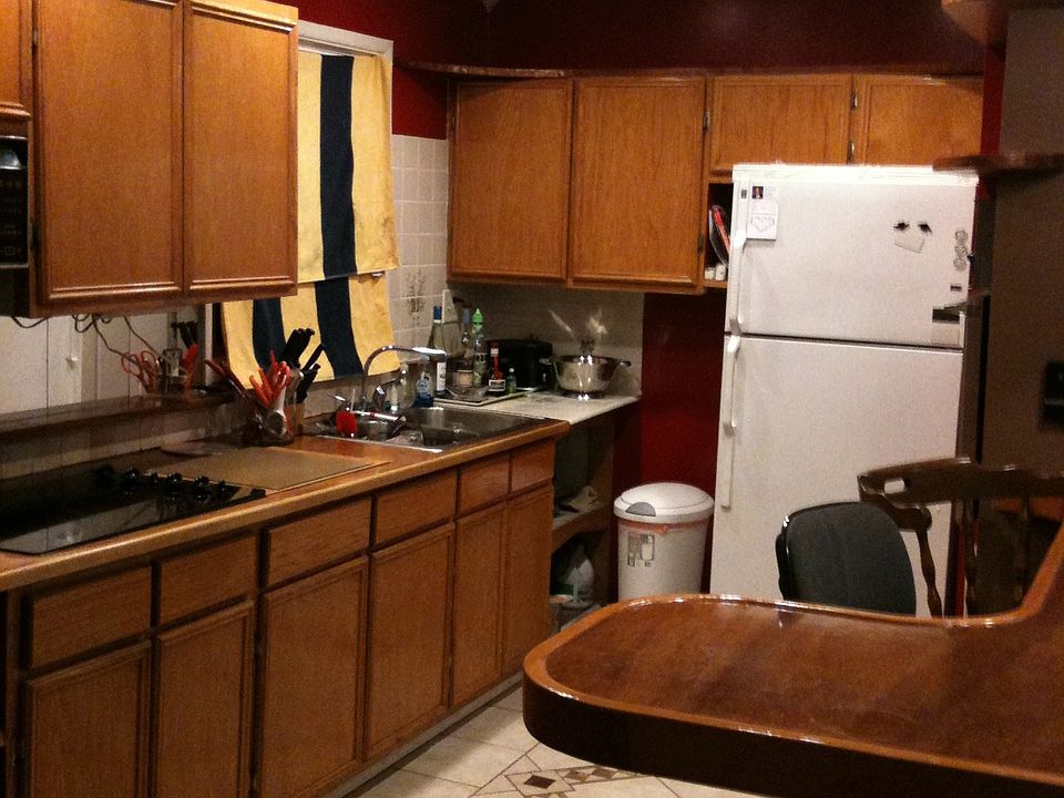 Kitchen with skylight and tile floor